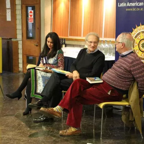 Three presenters on a panel in front of a LAC event banner. 2021