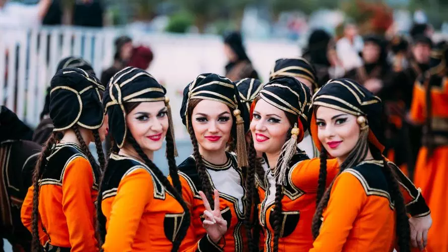 Young women dressed in traditional Georgian folk costumes