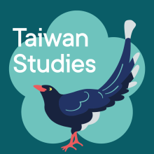 A graphic illustration of a blue bird against the outline of a flower. 
