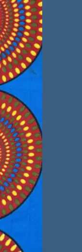 A section of fabric showing brightly coloured red, yellow and blue patterned circles