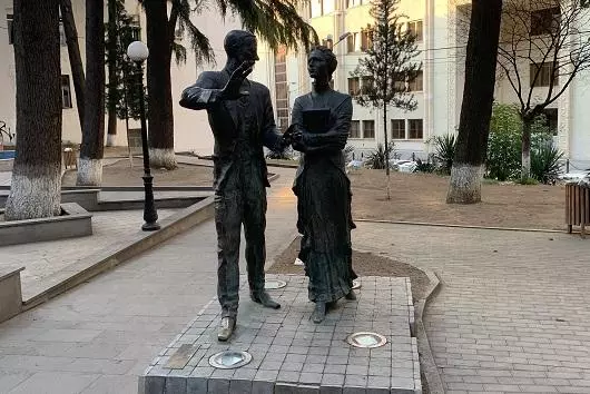 Statue of Oliver and Marjory Wardrop in a small pedestrianised square in Tbilisi